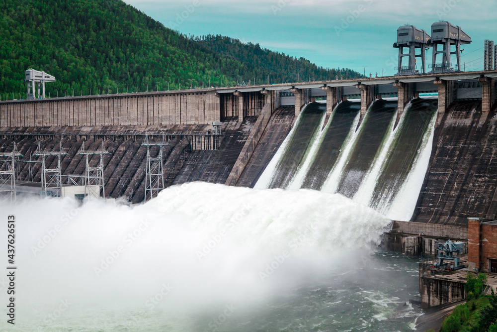 Water discharge at the Krasnoyarsk HPP in the spring due to flooding. Water discharge at the Krasnoyarsk HPP in the spring due to flooding.
