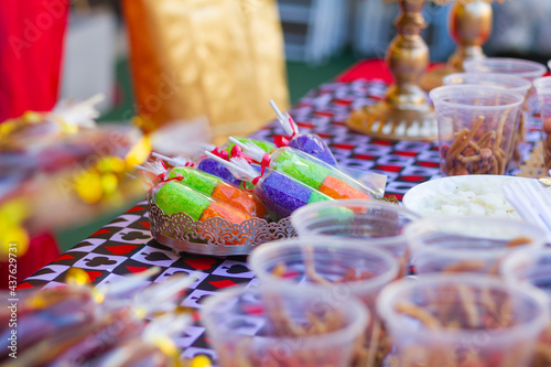 Candy table at a party with sweet desserts