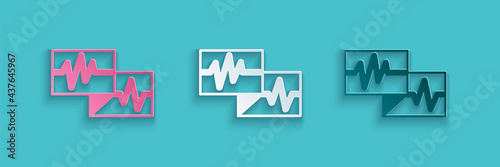 Paper cut Computer monitor with cardiogram icon isolated on blue background. Monitoring icon. ECG monitor with heart beat hand drawn. Paper art style. Vector