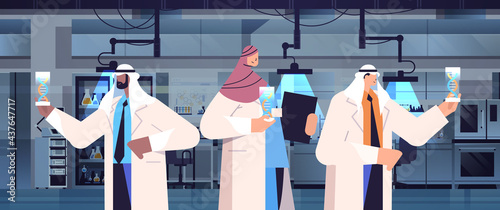 arabic scientists working with DNA arab researchers making experiment in lab DNA testing genetic diagnosis concept