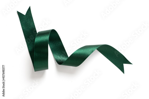A roll green ribbon isolated on white