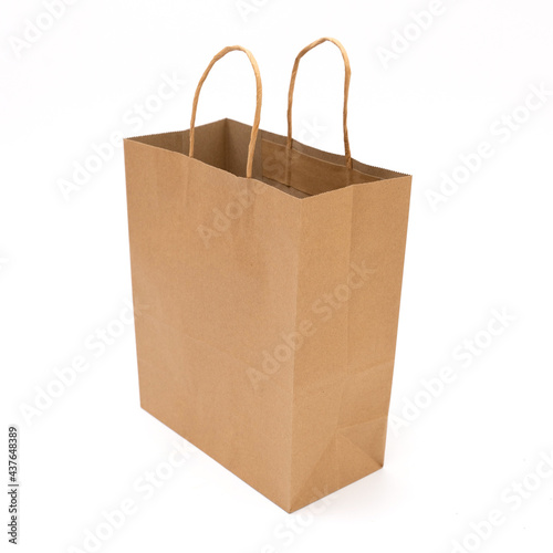 recycled paper shopping bags on white