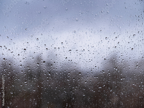 raindrops on window glass, autumn season