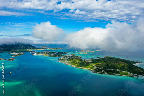 Aerial view of turquoise ocean, beaches, islands and mountains in Northern Norway