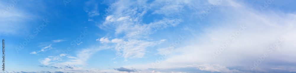 Panorama of cloudy blue day sky