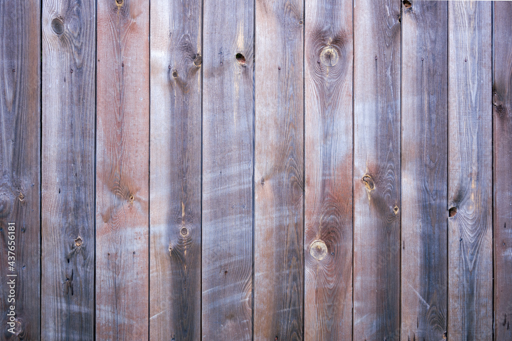 Aged wooden vertical planks. Weathered tiled background for creative designs and arts. Creativity, hobbies and occupation concept. Aged wooden vertical planks. Weathered tiled background for creative designs and arts. Creativity, hobbies and occupation concept.