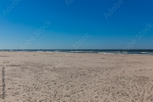 Dunes in the Slowinski National Park. Landscape with beautiful sky, clouds and dunes in the sun in Leba.