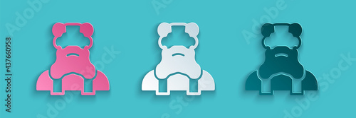 Paper cut Priest icon isolated on blue background. Paper art style. Vector