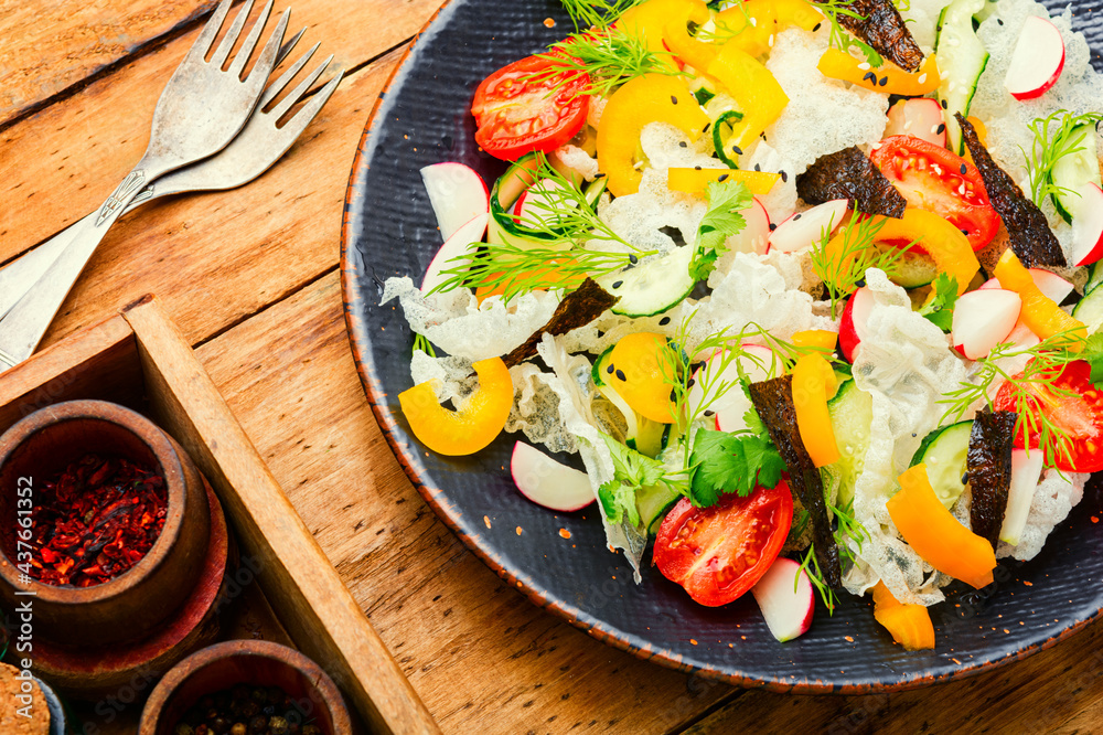 Vegetable salad decorated with rice paper,vegan food