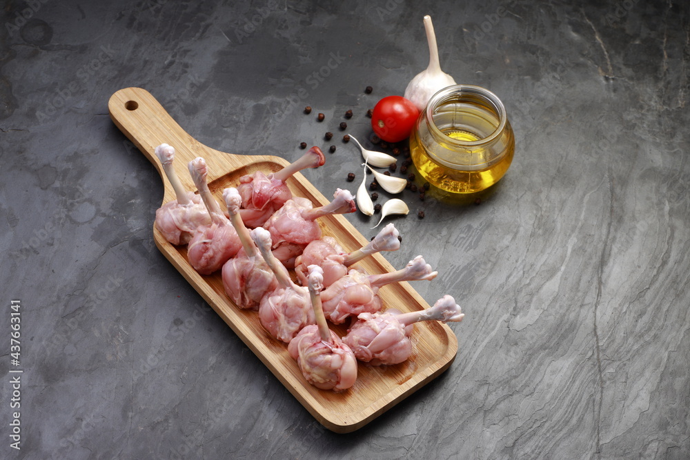 Raw chicken lollipop Stock Photo | Adobe Stock