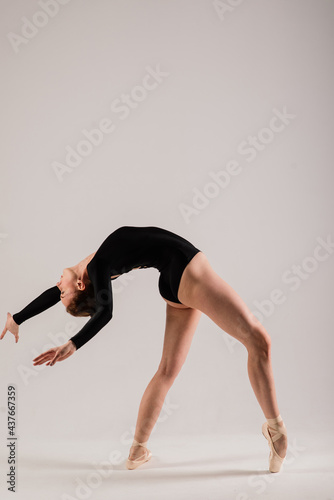 Young ballet dancer isolated on white background