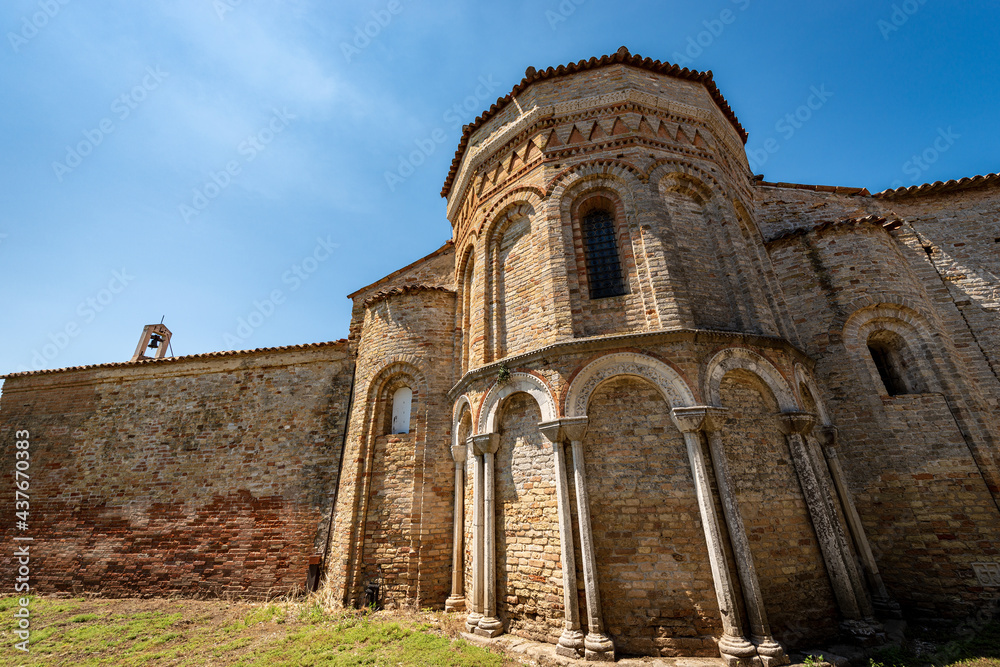 Apse of the Church of Santa Fosca (IX-XII century) in Torcello Island in Venetian-Byzantine style, part of the complex of the basilica and cathedral of Santa Maria Assunta. Venice, Veneto, Italy. 