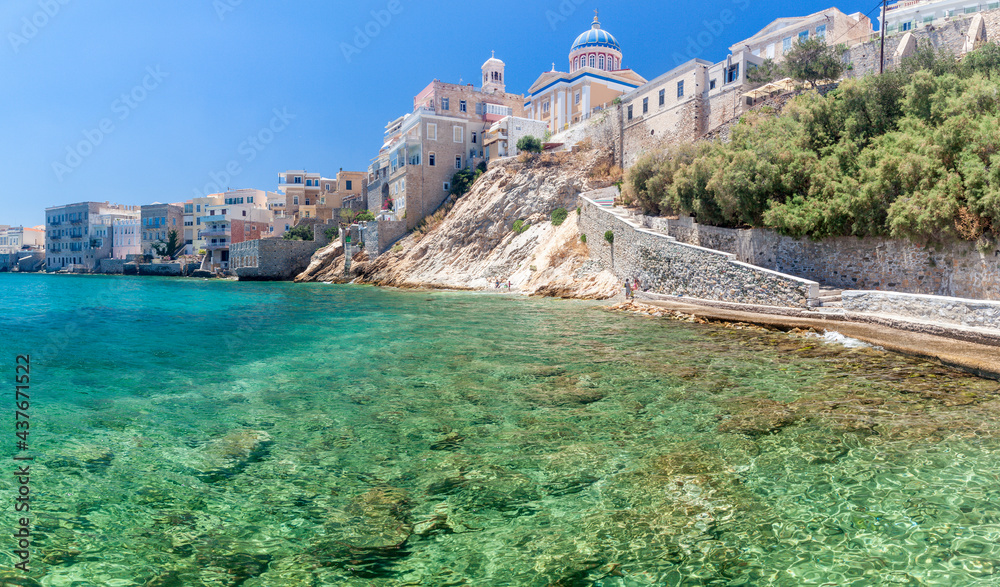 Vaporia district, the most picturesque part of Ermoupoli town, the capital of Syros island, Greece, with its own rocky beach and many old traditional houses, most owned by old captains. 