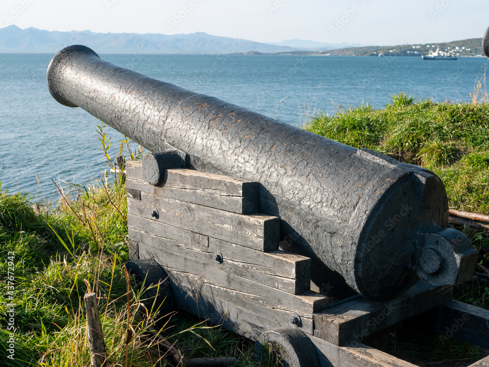 Kamchatka Peninsula, Russia - October 30, 2018: Park with guns on Nikolskaya Sopka. The guns were installed in the place of Lieutenant Maksutov's III battery for defense. Kamchatka Peninsula, Russia - October 30, 2018: Park with guns on Nikolskaya Sopka. The guns were installed in the place of Lieutenant Maksutov's III battery for defense.