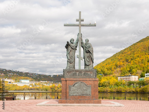 Kamchatka Peninsula, Russia - October 1, 2018: Bronze monument depicting the apostles Peter and Paul. The monument was erected in the central square near the lake.