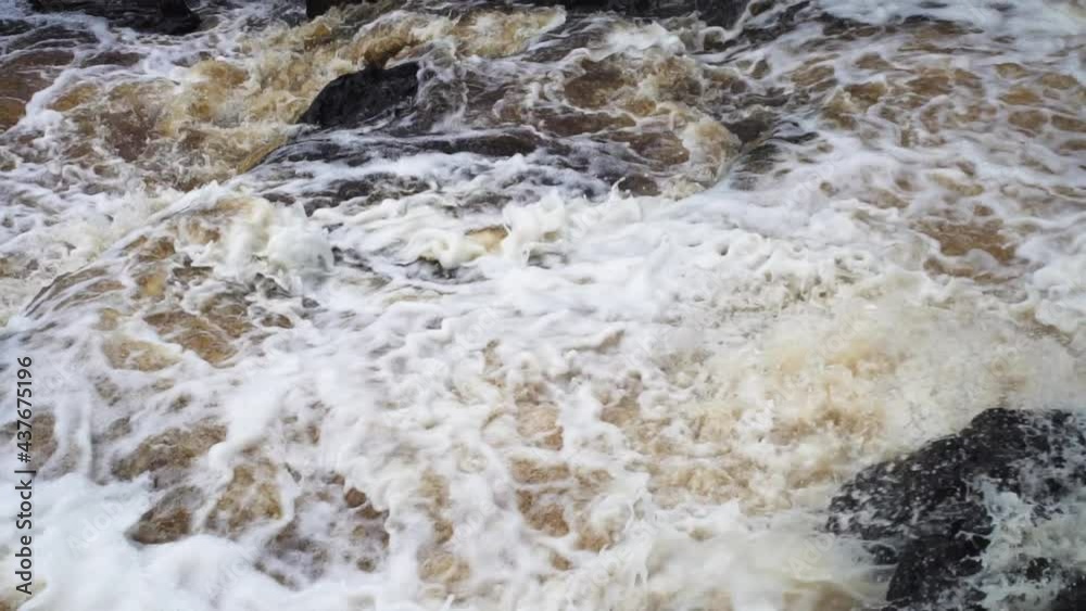 Strong and wild stream flow of water in wilderness. Fast mountain river slow motion. Russian Karelia nature Strong and wild stream flow of water in wilderness. Fast mountain river slow motion. Russian Karelia nature