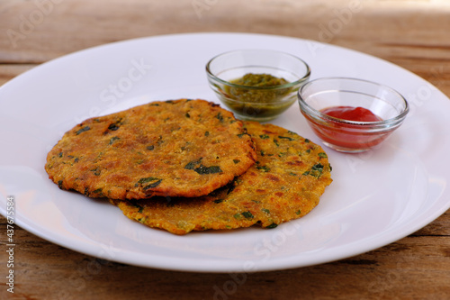 Variety of Indian flat bread thepla or paratha photo