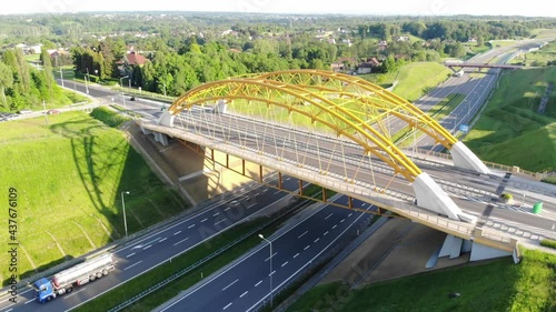 Yellow bridge over highway in Europe