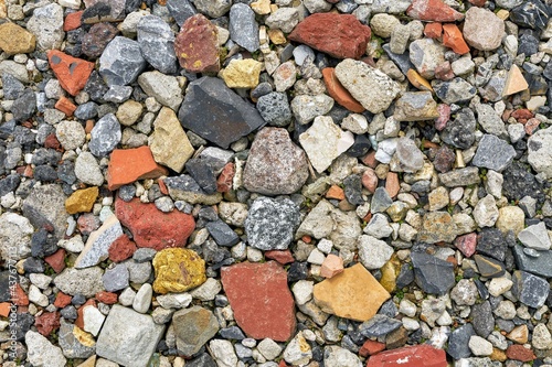 Close up of crushed building rubble stones. Construction waste 
