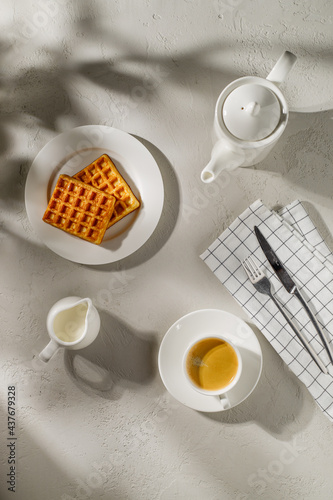 coffee with waffles on a white background