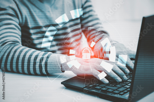 Fototapeta Naklejka Na Ścianę i Meble -  Hand Hacker touch laptop or smartphone and Touching in graph Screen code of a media screen on the White background, Technology Process System Business and hacks online concept, Copy space