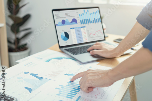 Quadro su tela Businesspeople working in finance and accounting Analyze financial graph budget and planning for future in office room
