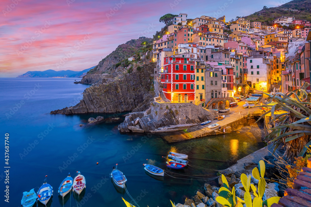 Riomaggiore,  Colorful cityscape on the mountains over Mediterranean sea in Cinque Terre Italy