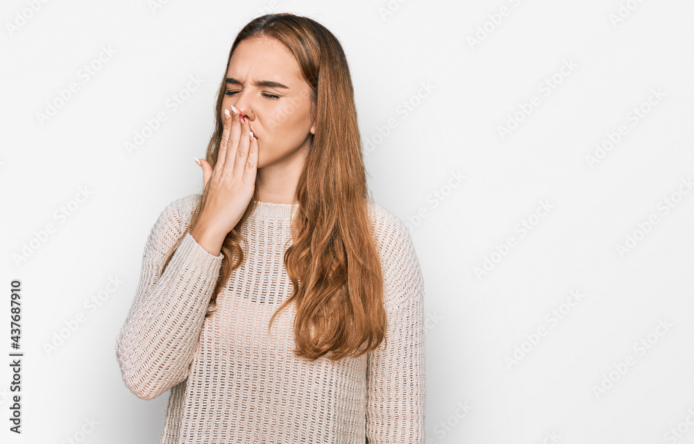 Young blonde woman wearing casual clothes bored yawning tired covering mouth with hand. restless and sleepiness. Young blonde woman wearing casual clothes bored yawning tired covering mouth with hand. restless and sleepiness.