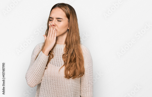 Young blonde woman wearing casual clothes bored yawning tired covering mouth with hand. restless and sleepiness.