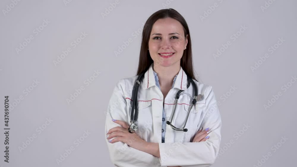 Portrait of smiling female doctor in medical Uniform smiling looking at camera with stethoscope isolated on white background. Health care and medical concept. Medical workers. Portrait of smiling female doctor in medical Uniform smiling looking at camera with stethoscope isolated on white background. Health care and medical concept. Medical workers.