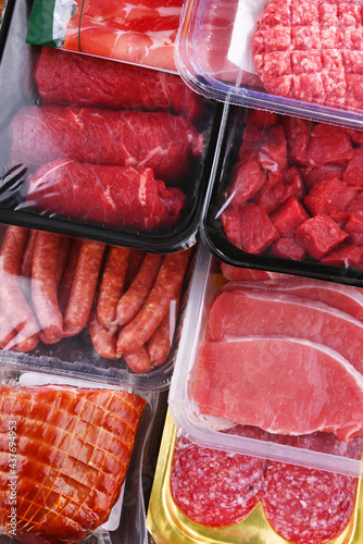 Composition with packages of assorted meat products