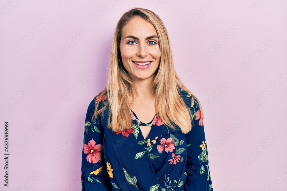 Young caucasian woman wearing casual clothes with a happy and cool smile on face. lucky person. Young caucasian woman wearing casual clothes with a happy and cool smile on face. lucky person.
