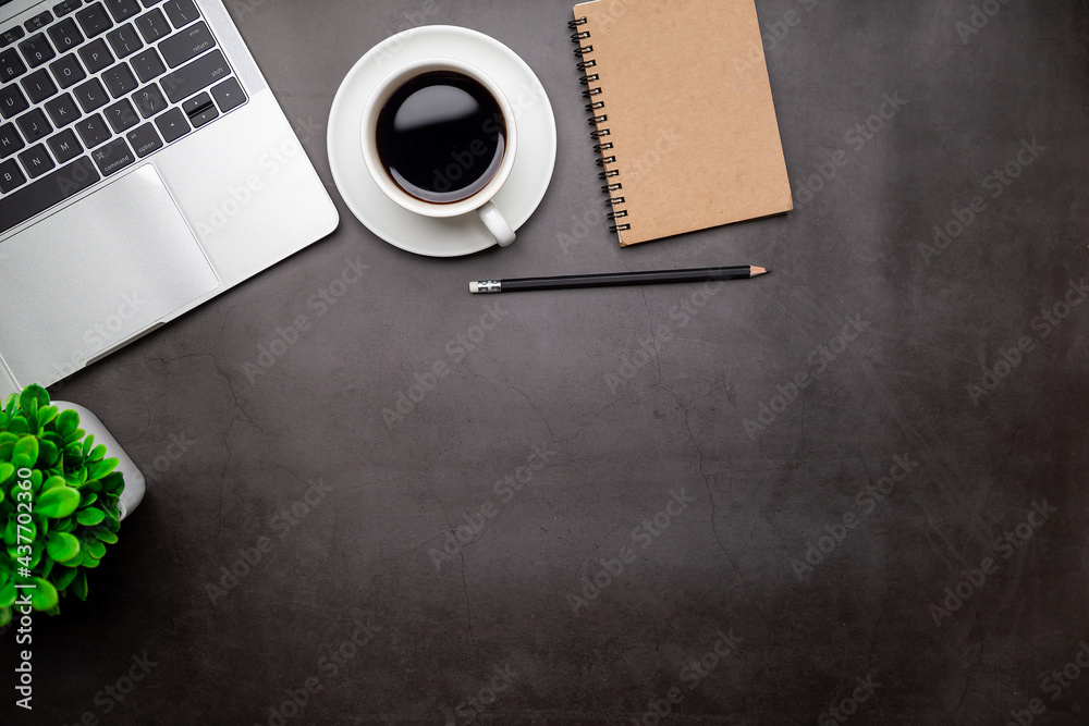 Top view desk,Modern office desk Workspace with laptop computer, coffee cup, glasses,notebook and office supplies for Working background concept. Top view desk,Modern office desk Workspace with laptop computer, coffee cup, glasses,notebook and office supplies for Working background concept.