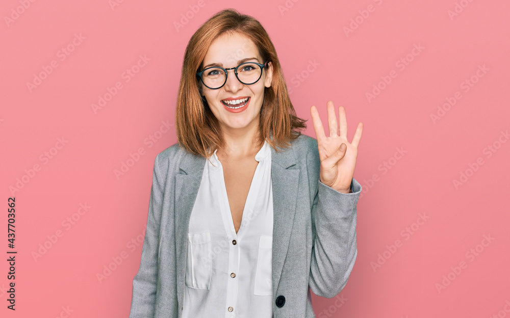 Young caucasian woman wearing business style and glasses showing and pointing up with fingers number four while smiling confident and happy. Young caucasian woman wearing business style and glasses showing and pointing up with fingers number four while smiling confident and happy.