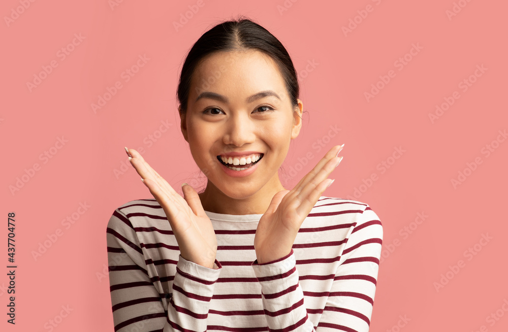 Surprised Young Korean Lady Raising Hands And Looking At Camera With Excitement Surprised Young Korean Lady Raising Hands And Looking At Camera With Excitement