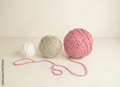pastel woolen balls on withe ground