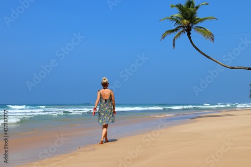 pretty girl on a dream beach with palm trees - Sri Lanka, Asia