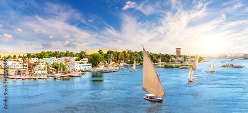Aswan city in Egypt, beautiful scenery of the Nile river with felucca boats