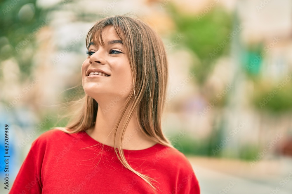 Caucasian teenager girl smiling happy standing at the city. Caucasian teenager girl smiling happy standing at the city.