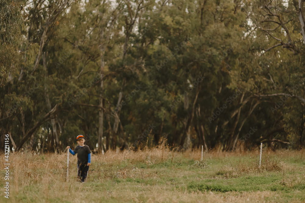 Image of little boy in nature with copy space Image of little boy in nature with copy space
