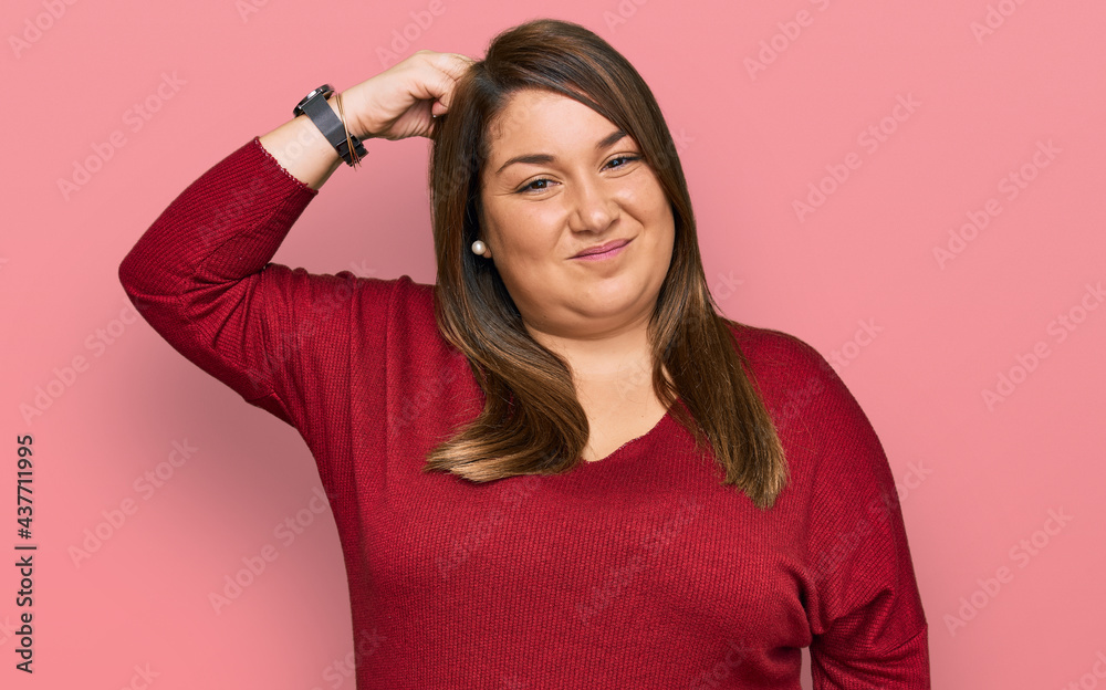 Beautiful brunette plus size woman wearing casual clothes confuse and wonder about question. uncertain with doubt, thinking with hand on head. pensive concept. Beautiful brunette plus size woman wearing casual clothes confuse and wonder about question. uncertain with doubt, thinking with hand on head. pensive concept.