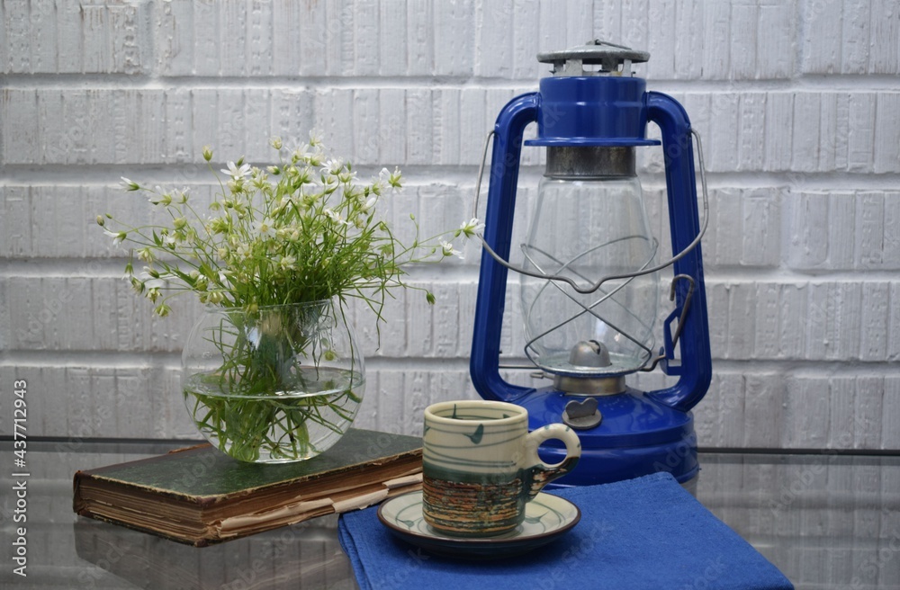 cup of coffee and cake, old lamp