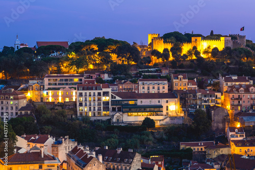 night view of saint jorge castle at lisbon in portugal