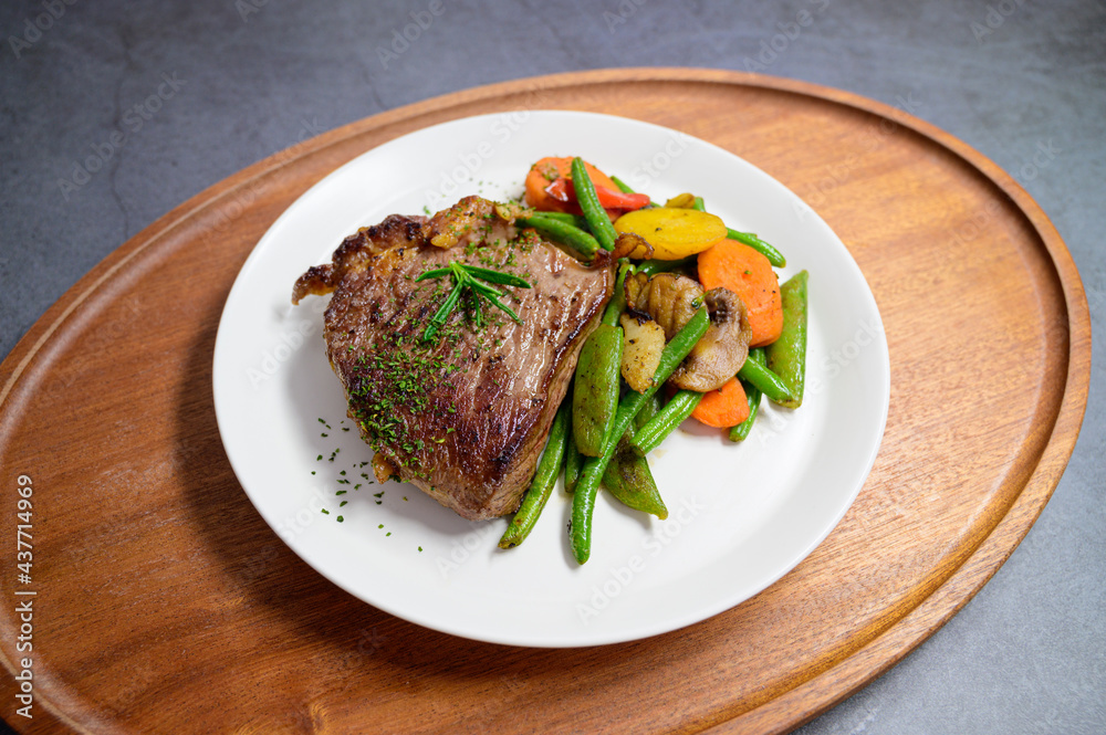 grilled beef steak and vegetables