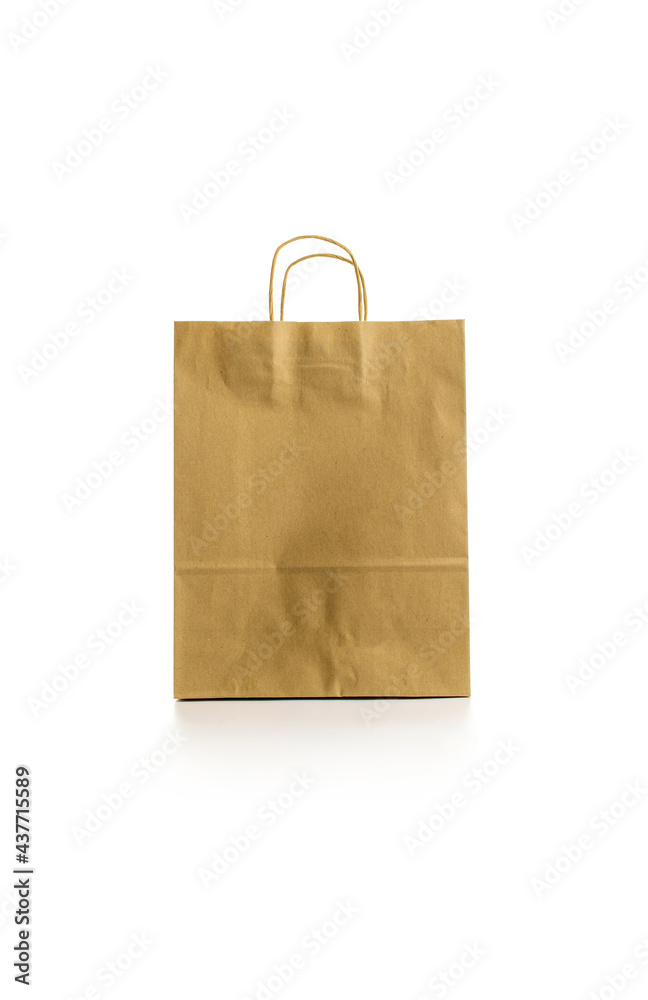 Craft paper bag. Brown package with kraft recycle texture, empty blank space for design mockup isolated on white background. Delivery service concept. Copy space. Advertising area.