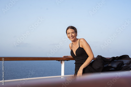 portrait of a beautiful young tourist in a cruise trip in the Mediterranean sea