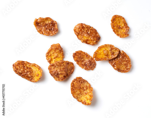 Chocolate cornflakes placed on a white background.