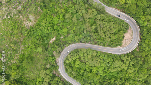 Winding road through the mountain pass, Aerial view by drone.