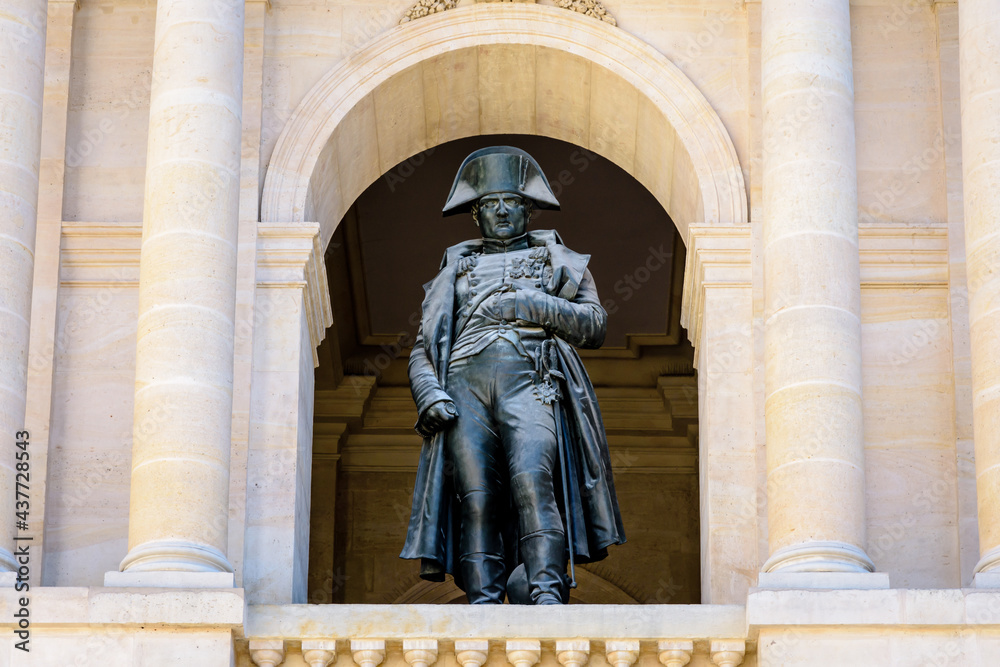 Low angle view of the statue of Napoleon Bonaparte on the balcony in the Hotel des Invalides in Paris, France