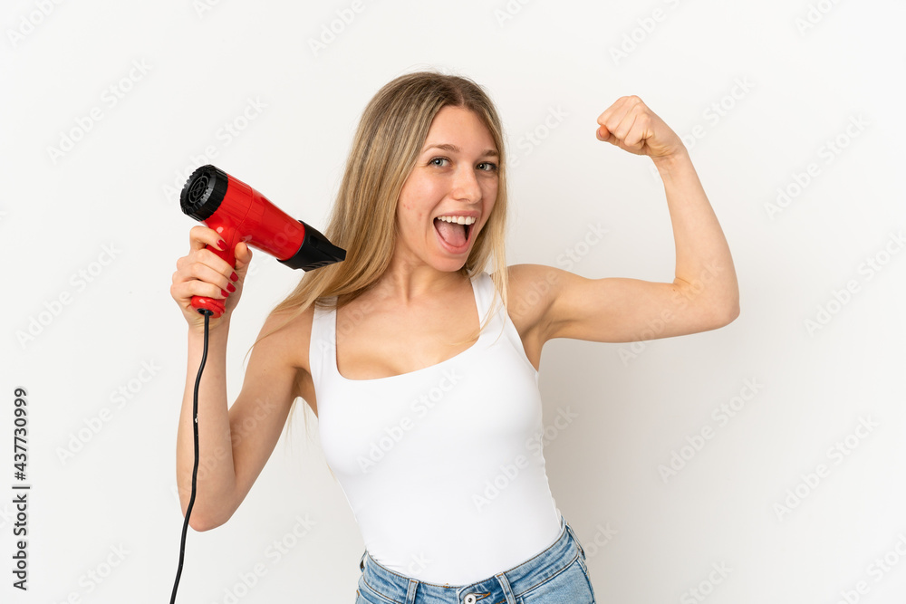 Woman with a hairdryer over isolated background Woman with a hairdryer over isolated background